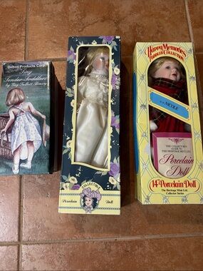 Porcelain Doll Trio in Original Boxes - Cream, Red, Black